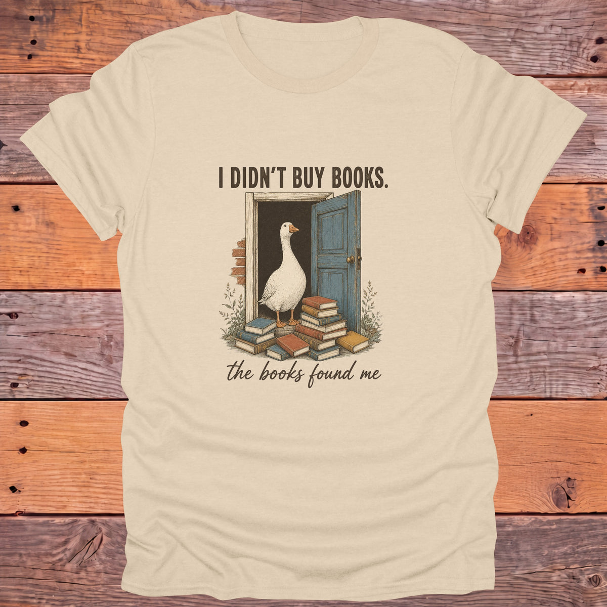 I Didn't Buy Books The Books Found Me Goose Bookish T-Shirt - Sand