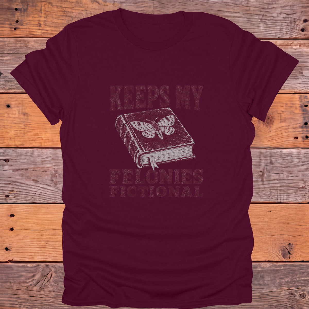 Keeps My Felonies Fictional Bookish T-Shirt - Maroon
