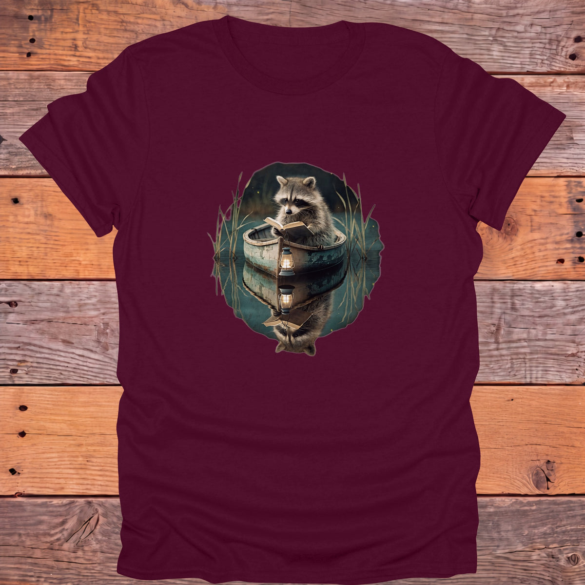 Raccoon Reading in a Rowboat Bookish T-Shirt - Maroon